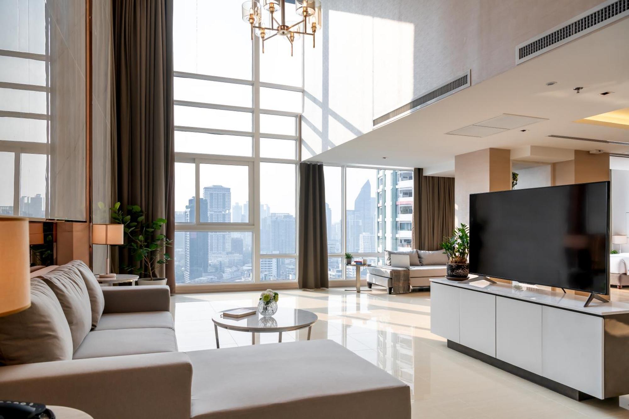Jasmine 59 Hotel Bangkok Exterior photo A living room in a luxury apartment